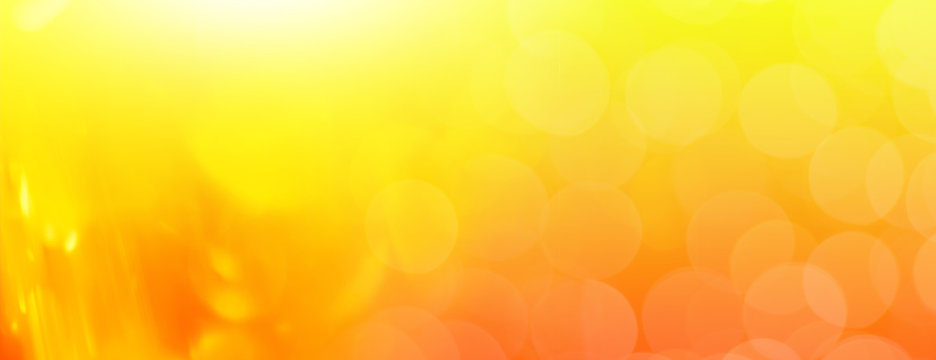 abstract orange background with  bokeh lights and sunlight, panoramic background