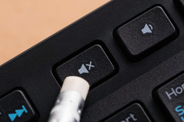 Press mute button on keyboard. Soundless.