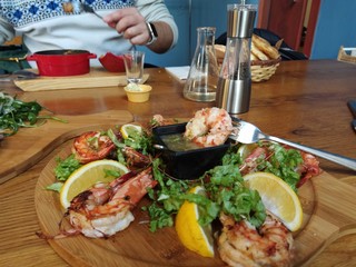 grilled shrimp. grilled fish food on a plate in a fish restaurant
