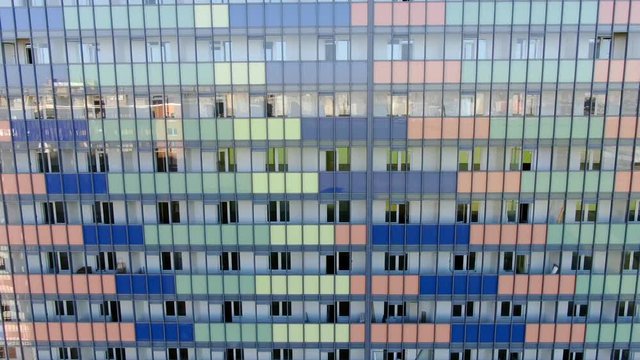 Top view of the Windows of a residential luxury home background. Motion. Colored apartment building