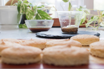Tiramisu cookies lie on the background of ready-made cakes