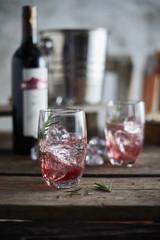 Grape juice cocktail with rosemary. .