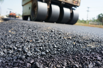 Asphalt road construction in Thailand, blurred pictures