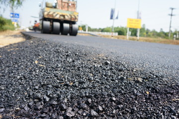 Asphalt road construction in Thailand, blurred pictures