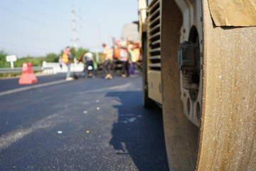Fototapeta na wymiar Asphalt road construction in Thailand, blurred pictures
