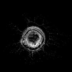 Water splashing isolated over a black background.