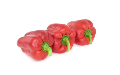Red peppers on a white background