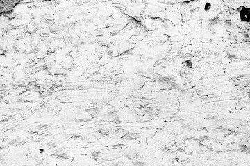 Texture of a concrete wall with cracks and scratches which can be used as a background