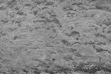 Texture of a concrete wall with cracks and scratches which can be used as a background