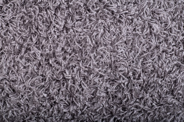 Carpet covering background. Pattern and texture of gray colour carpet. Copy space