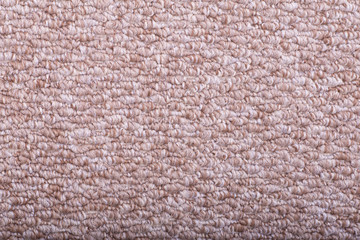 Carpet covering background. Pattern and texture of light brown carpet. Copy space