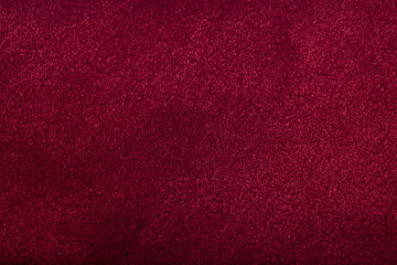 Fototapeta premium Carpet covering background. Pattern and texture of scarlet carpet. Copy space.