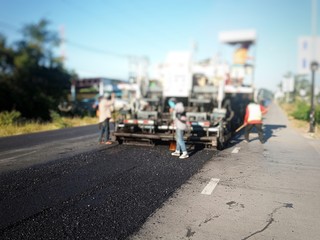 Road construction by method Hot Mix Asphalt Recycling, Blurred images