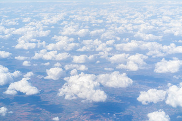 Flying above cloudscape and blue sky
