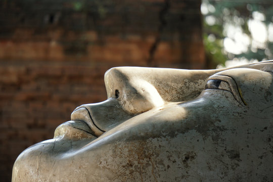 The close up face of white marble buddha statue, Mandalay, Myanmar