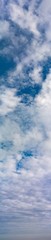 Fantastic clouds against blue sky, panorama