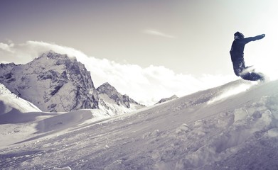 Mountains of the Caucasus, Dombay. Snowboard.
