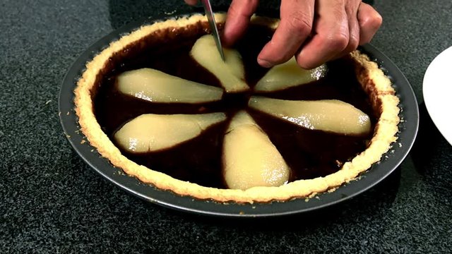 Making lengthways cuts all along each pear. Making Chocolate, Pear and Pecan Pie.