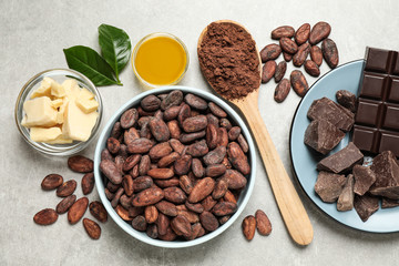 Flat lay composition with organic cocoa butter on light grey table