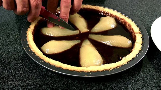 Making lengthways cuts all along each pear. Making Chocolate, Pear and Pecan Pie.