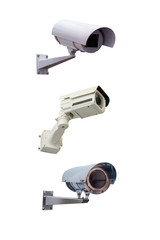 Three modern video cameras to track the situation at the object on a white background. Vertically