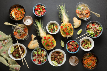 Thai food in the restaurant. Various traditional dishes. Pineapple fried rice