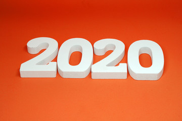 2020 object on orange background - Happy new year 2020 concept - orange  pattern 