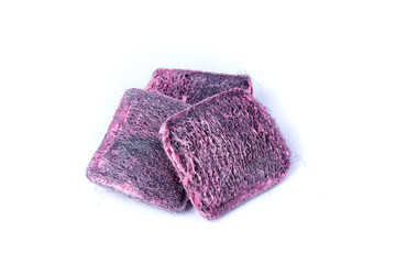 Square pink soap filled steel wool scrub pads