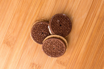 Several tasty hispanic sandwich snack cookies stacked together