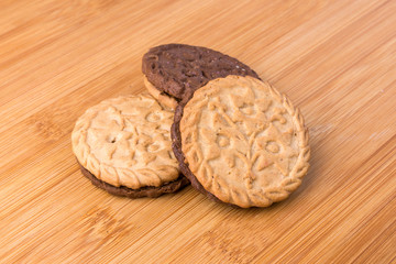 Several tasty hispanic sandwich snack cookies stacked together