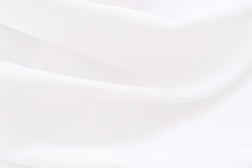 Background of white cloth with soft waves.