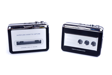 Two black and silver plastic usb cassette converter machine