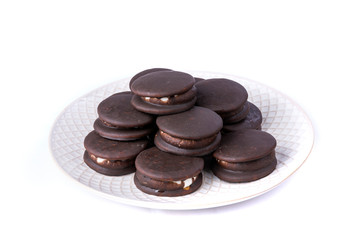 Stack of marshmallow chocolate covered sandwich cookies
