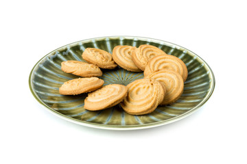 Stack of brittle mexican shortbread cookies on a plate