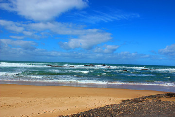 Cloudy blue sky at the beach