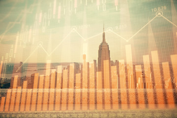 Obraz premium Forex graph on city view with skyscrapers background multi exposure. Financial analysis concept.