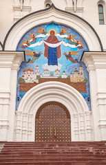 Entrance to  old Assumption Cathedral with  mosaic icon of  Protection of  Holy Virgin in Yaroslavl
