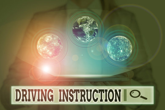 Writing note showing Driving Instruction. Business concept for detailed information on how driving should be done Elements of this image furnished by NASA