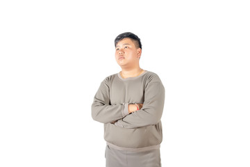 Portrait of fatty boy with hands folded and think isolated on white background