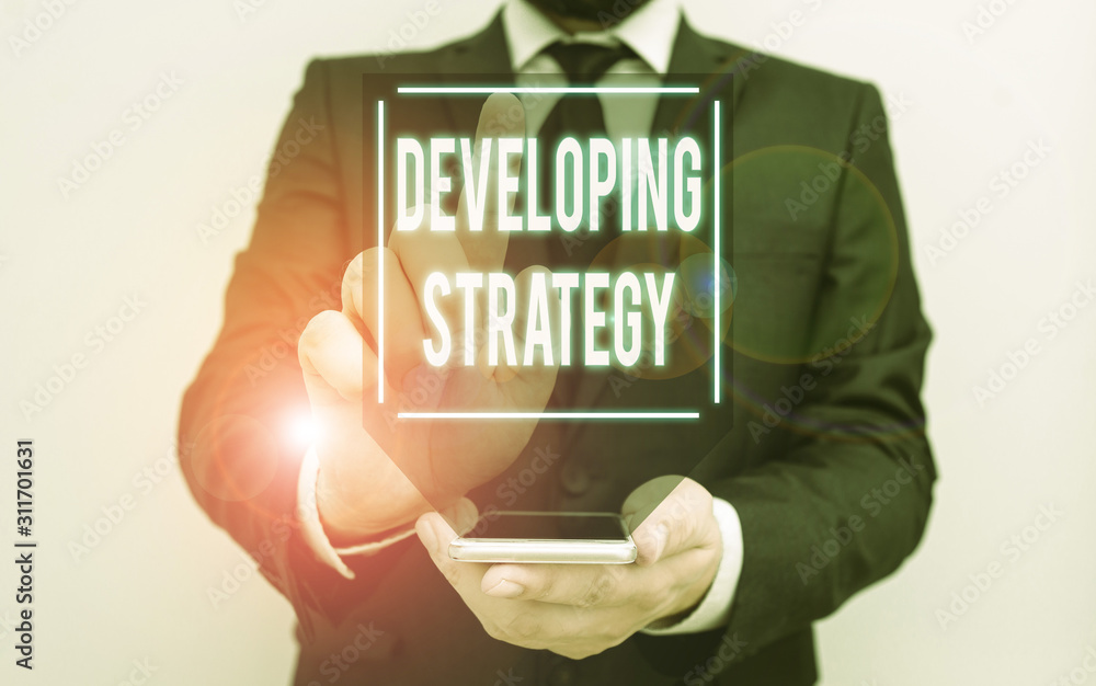 Poster conceptual hand writing showing developing strategy. concept meaning game plan that sets specific go