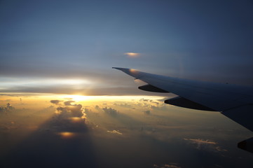 Plakat sunrise view in a plane