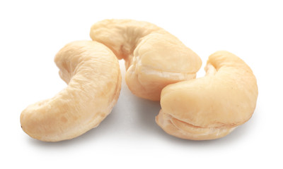 Tasty cashew nuts on white background