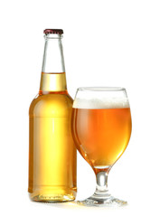 Glass and bottle of fresh beer on white background