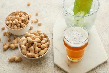 Fresh beer and snacks on table