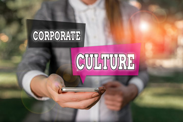 Conceptual hand writing showing Corporate Culture. Concept meaning beliefs and attitudes that...