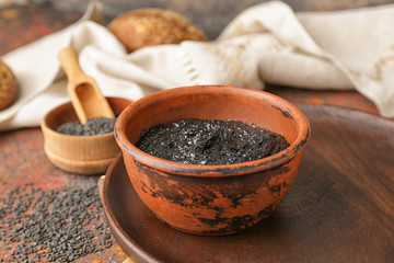 Bowl of tasty tahini on table