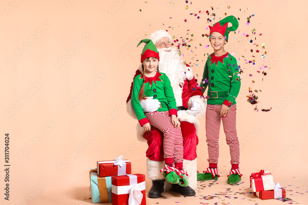 Sticker Santa Claus and little elf kids with gifts on color background