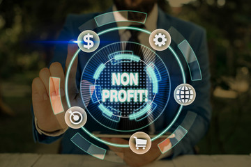 Conceptual hand writing showing Non Profit. Concept meaning not making or conducted primarily to make profit organization