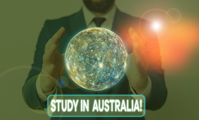 Conceptual hand writing showing Study In Australia. Concept meaning going into foreign country...