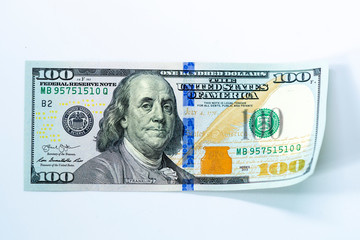 USD 100 dollars banknotes on isolated white background, Money currency of United States (USA), USD Dollar Bank note pile, Business and finance concept.